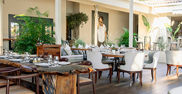 A view of the Nusr-Et restaurant at D Maris Bay resort, a part steakhouse part show restaurant that proosies guests an unforgettable dining experience.